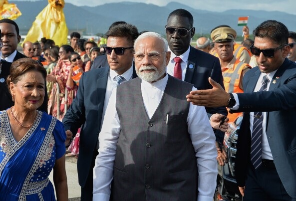 Modi Walking Trini